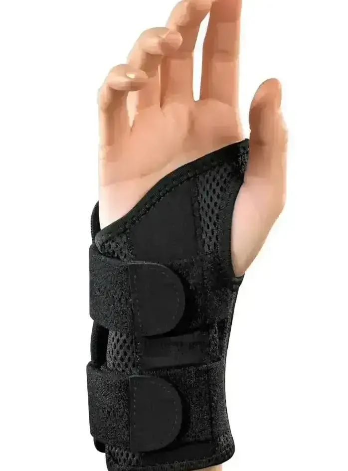 Mueller Green Fitted Carpal Tunnel Wrist Brace for injury support and pain relief.