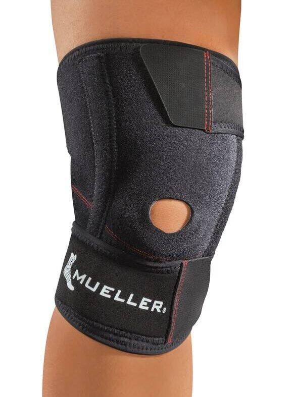 Mueller wraparound knee stabilizer providing support and protection for injured knees.