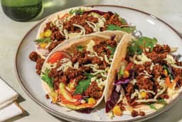 HelloFresh Texan Beef & Bacon Deluxe Salad Tacos with Cheddar Cheese & BBQ Mayo: A hearty, protein-packed meal for health and fitness enthusiasts.