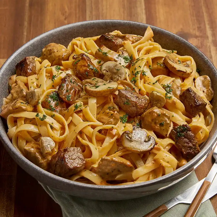 Creamy beef stroganoff with mushrooms and pasta for Health and Fitness meal plans.