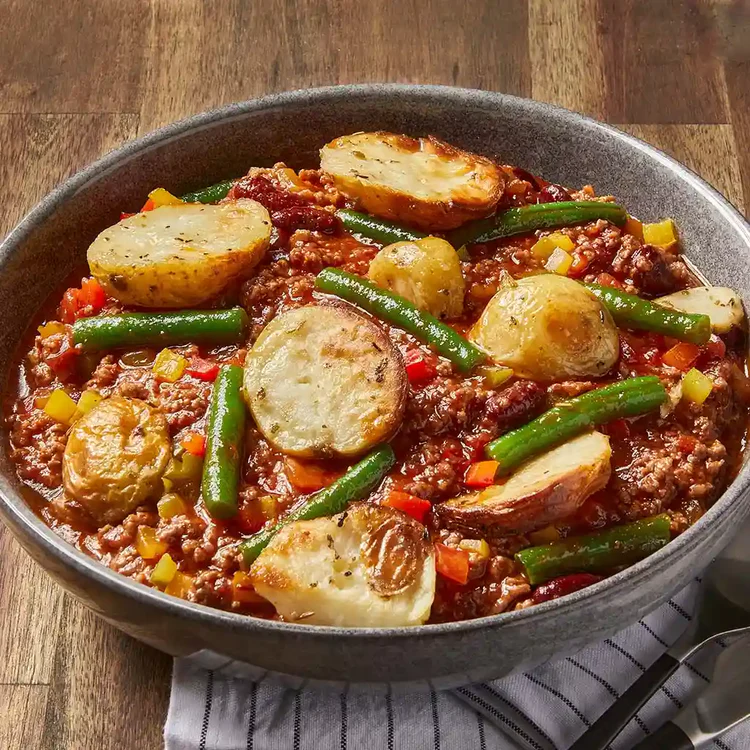 Beef chili with roasted potatoes, green beans, and vibrant vegetables for Health and Fitness.